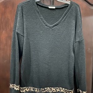 Black sweater with leopard print trim